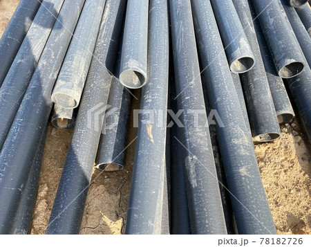Plastic main pipes. A heap of polyethylene pipes for a water supply system. Objects for laying of city communications and the sewerage. The concept of laying urban communications Plastic main pipes. A heap of polyethylene pipes for a water supply system. Objects for laying of city communications and the sewerage. The concept of laying urban communications 78182726