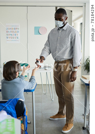 Hand Sanitizing in School Classroom Hand Sanitizing in School Classroom 78184294