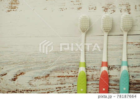Toothbrush with space copy on wooden background 78187664