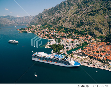 Top view of the pier with a big boat and town. Top view of the pier with a big boat and town. 78190076