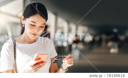 Young adult business asian woman consumer using creadit card and smartphone for shopping online. Young adult business asian woman consumer using creadit card and smartphone for shopping online. 78190618