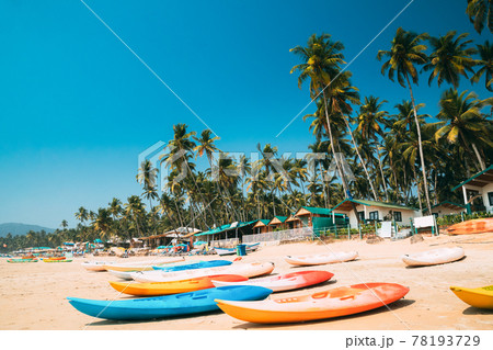 Canacona, Goa, India. Canoe Kayak For Rent Parked On Famous Palolem Beach On Background Tall Palm Tree In Summer Sunny Day 78193729