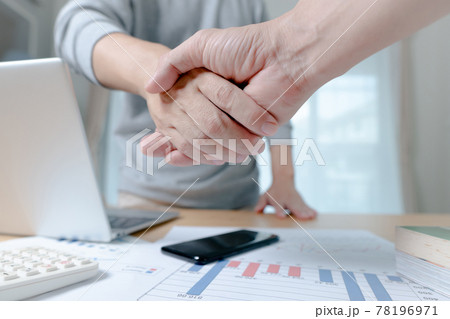 Businessman are shaking hands in office. Collaborative teamwork. Businessman are shaking hands in office. Collaborative teamwork. 78196971