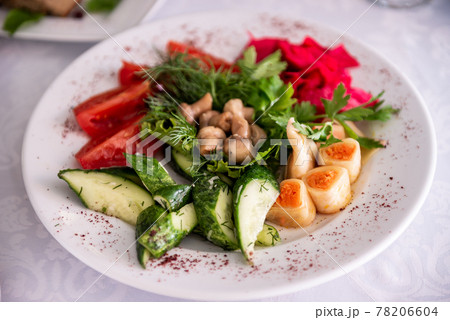 Vegetable salad with cucumber, tomato, cheese, toast, mushrooms, herbs 78206604