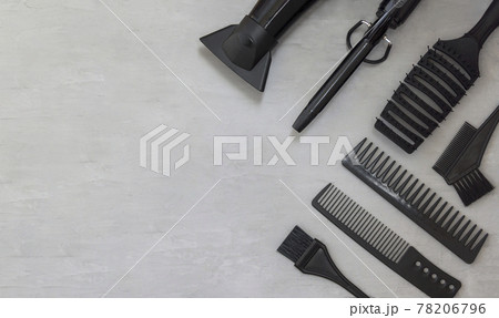 Background, frame with hairdressing tools on gray. Template for information. Background, frame with hairdressing tools on gray. Template for information. 78206796