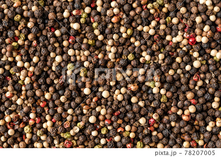 Mixed peppercorns texture. Background with copyspace. Close up. Top view 78207005