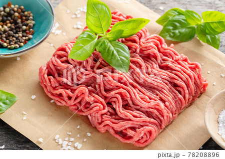 Minced meat with spices on table 78208896