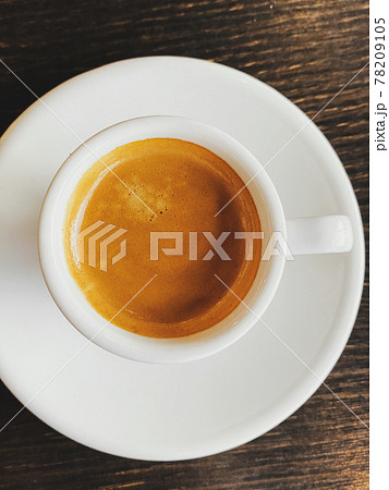 Fresh italian espresso in cup on table 78209105