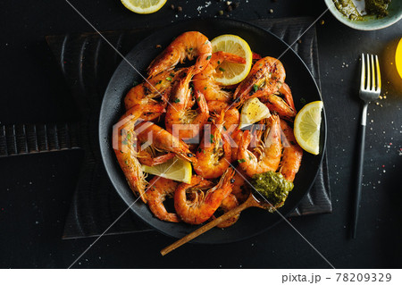 Shrimps with spices on plate Shrimps with spices on plate 78209329