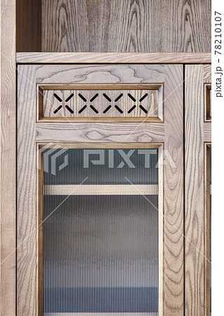 Part of cabinet made of toned veneer and solid ash 78210107