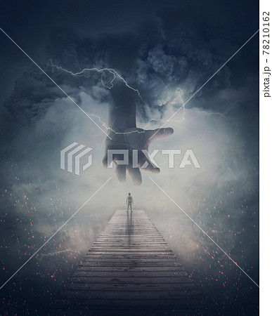 Surreal scene, a man on a pier and a scary giant hand comes from the mist and lightnings. Wormhole teleport to another world through the storm. Mysterious wonderland, fantastic adventure concept 78210162