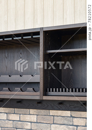 Upper cabinet of toned black solid ash with dish dryer and bottle and wineglass holders Upper cabinet of toned black solid ash with dish dryer and bottle and wineglass holders 78210572