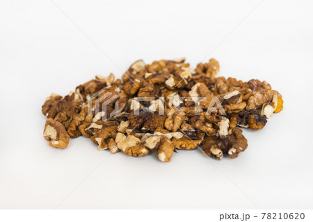 Walnuts isolated on white background, selective focus Walnuts isolated on white background, selective focus 78210620