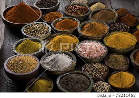 Aromatic spices on wooden background Aromatic spices on wooden background 78211465