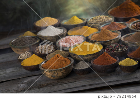 Cookbook and various spices background Cookbook and various spices background 78214954