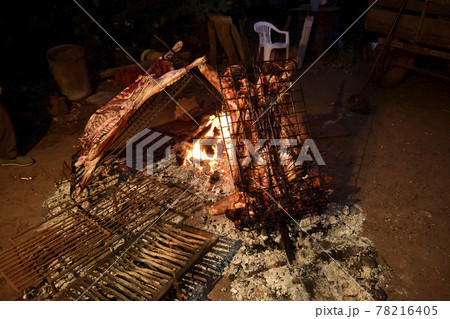 Lamb on the spit, roast lamb, Patagonia 78216405
