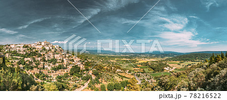 Gordes, Provence, France. Beautiful Scenic View Of Medieval Hilltop Village Of Gordes. Sunny Summer Sky. Famous Landmark. panorama scenic view Gordes, Provence, France. Beautiful Scenic View Of Medieval Hilltop Village Of Gordes. Sunny Summer Sky. Famous Landmark. panorama scenic view 78216522