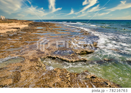 Ayia Napa rocky beach seafront, Cyprus. 78216763