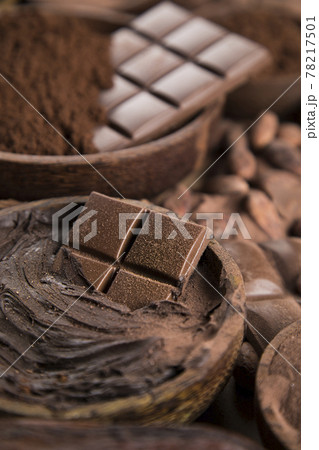 Chocolate sweet, cocoa pod and food dessert background Chocolate sweet, cocoa pod and food dessert background 78217501