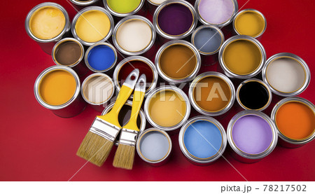Paintbrush on cans with color Paintbrush on cans with color 78217502