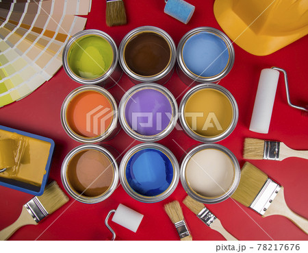 Metal tin cans with color paint and paintbrush Metal tin cans with color paint and paintbrush 78217676