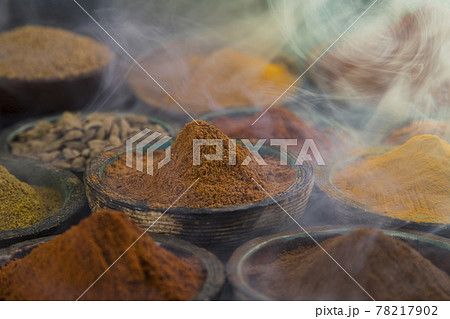 Aromatic spices on wooden background 78217902