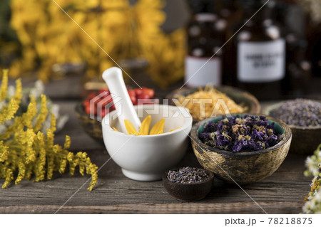 Fresh medicinal herbs on wooden background 78218875