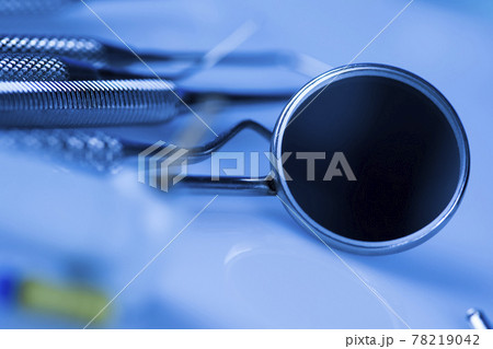 Dentist equipment on blue background Dentist equipment on blue background 78219042