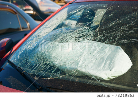 broken windshield of a car from a shot of an airbag 78219862