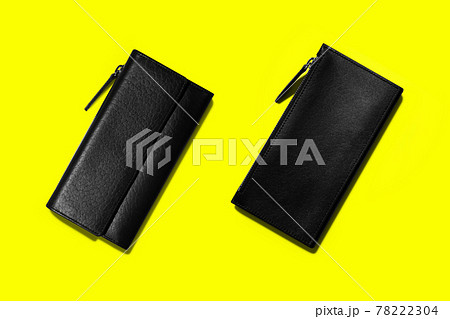 Fashionable leather women wallets on a yellow background. added copy space for text. 78222304