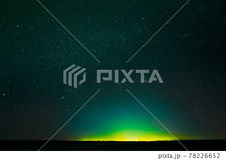 Night Sky Glowing Stars Background Backdrop With Sky Gradient. Colourful Night Starry Sky In Green Colors.Copy Space 78226652