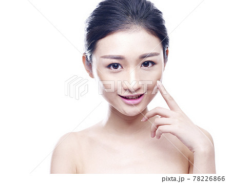 studio portrait of a young asian woman, isolated on white. studio portrait of a young asian woman, isolated on white. 78226866