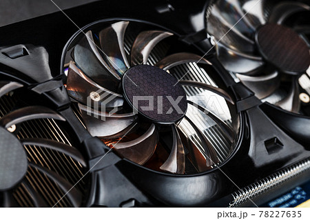 A video card with three fans is hardly a powerful cooling system. 78227635