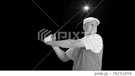 Composition of caucasian male golf player with golf club and copy space in black and white 78231059