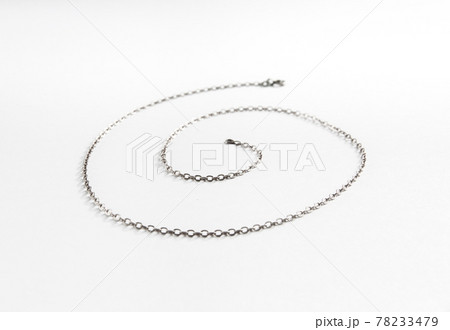 Silver chain necklace isolated on white background 78233479
