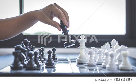 Businesswoman holding chess to take down opposing players, Proactive business planning and marketing strategy just like playing chess, Business competition and success, Leadership concept. Businesswoman holding chess to take down opposing players, Proactive business planning and marketing strategy just like playing chess, Business competition and success, Leadership concept. 78233897