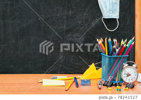 school still life, stationery on the table and a medical mask in the background school board, school, university school still life, stationery on the table and a medical mask in the background school board, school, university 78241527