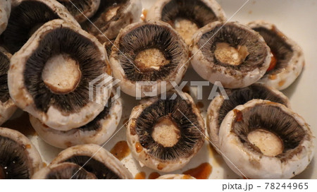 Champignon white mushrooms with soya sauce. Organic White mushrooms marinated for vegan grill Champignon white mushrooms with soya sauce. Organic White mushrooms marinated for vegan grill 78244965