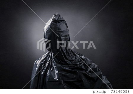 Creepy figure over dark misty background 78249033
