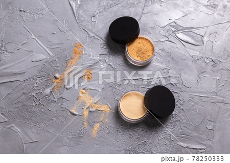 Mineral powder of different colors with a brushes for make-up on wooden background, copyspace Mineral powder of different colors with a brushes for make-up on wooden background, copyspace 78250333