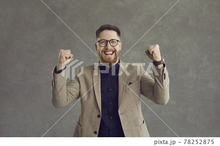 Adult caucasian business man showing yes rejoice expression clenching fists 78252875
