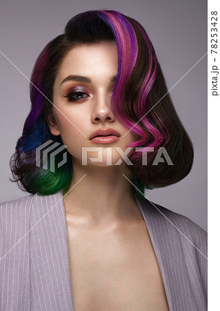 Beautiful woman with multi-colored hair and classic make up and hairstyle. Beauty face. 78253428