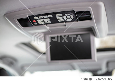 screen multimedia system control panel. Interior detail of modern luxury car dashboard with big display and light button switch on ceiling. Screen multimedia system screen multimedia system control panel. Interior detail of modern luxury car dashboard with big display and light button switch on ceiling. Screen multimedia system 78254165