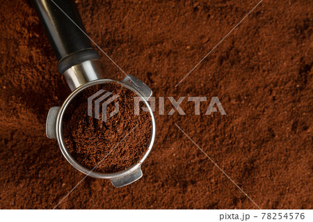 Coffee background with ground coffee Coffee background with ground coffee 78254576