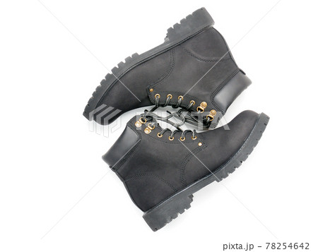 Suede boots with thick soles on a white background Suede boots with thick soles on a white background 78254642