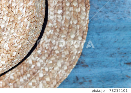 Details of a straw hat, close-up, isolated on white Details of a straw hat, close-up, isolated on white 78255101