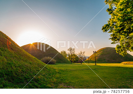 Sunset of Daereungwon ancient tomb in Gyeongju, Korea 78257756