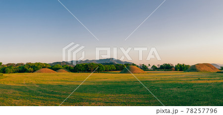 Sunset of Inwang-dong ancient tomb complex in Gyeongju, Korea 78257796