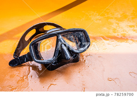 Snorkeling mask equipment on a seat. Snorkeling mask equipment on a seat. 78259700