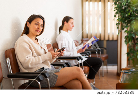Latino american woman waiting for job interview 78263239